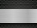 Brushed metal plate on perforated pattern Royalty Free Stock Photo