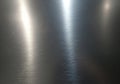 Brushed metal surface showing a smooth texture with linear Royalty Free Stock Photo