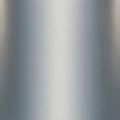 Brushed metal texture with horizontal grooves. The surface displays a gradient of silv Royalty Free Stock Photo