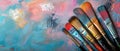 Brushes Arranged on Vibrant Colorful Artistic Background for Creative Expression Royalty Free Stock Photo