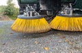 Brushes of cleaning street machine in the road