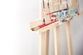 Brushes for painting on an easel stand on blurred background Royalty Free Stock Photo