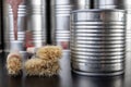 Brushes for painting with paint and cans on a workshop table. Painting accessories prepared for painting Royalty Free Stock Photo