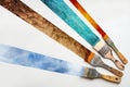 Brushes painting stipes of the four elements of nature, fire, water, earth and air on a white background, ecology concept for Royalty Free Stock Photo