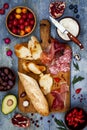 Brushetta or authentic traditional spanish tapas set for lunch table. Sharing antipasti on party picnic time on blue background Royalty Free Stock Photo