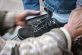 Brushing brush your black shoes with black cream Royalty Free Stock Photo