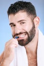 Brushing teeth, man and studio portrait of toothbrush for dental wellness, healthy lifestyle or mouth care. Happy face Royalty Free Stock Photo