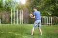 Brusilov, Ukraine - May 9, 2018: Athletic guy playing volleyball in the summer