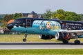 Brussels Airlines Airbus A320 airplane Brussels airport in Belgium Tintin special colors