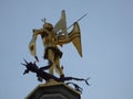 BRUSSELS - AUGUST 5, 2017: Saint George slaying the dragon statue on the city hall building tower