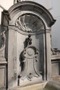 Brussels, B, Belgium - August 18, 2022: Statue of a boy while called Manneken Pis is a famous fountain Royalty Free Stock Photo