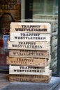 Empty wooden crate of Belgian beer in front of liquor store in Brussels, Belgium