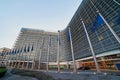 European Union EU flags waving in front of the Berlaymont building, headquarters of the European Commission in Brussels. Royalty Free Stock Photo