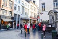 Group of tourists visiting Manneken Pis or Little Man Pee located near Grand Place in the city of Brussels, Belgium Royalty Free Stock Photo
