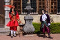 Two artists wearing venetian costumes and masks, Brussels Floralia