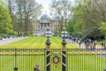 Brussels, Belgium - April 17 : A tourist standing in front of the golden gates of the royal palace in Brussels, Belgiumvon April