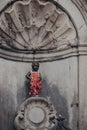 View of Manneken pis bronze fountain sculpture in central Brussels, Belgium Royalty Free Stock Photo