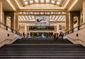 Commuters walking the stairs in the main hall of the central railwaystation