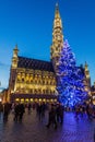 BRUSSELS, BELGIUM - DECEMBER 17, 2018: Christmas tree and the Town Hall at the Grand Place (Grote Markt) in Brussels Royalty Free Stock Photo