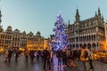 BRUSSELS, BELGIUM - DECEMBER 17, 2018: Evening view of the Grand Place (Grote Markt) with a christmas tree in Brussels Royalty Free Stock Photo