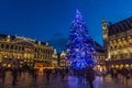 BRUSSELS, BELGIUM - DECEMBER 17, 2018: Evening view of the Grand Place & x28;Grote Markt& x29; with a christmas tree and Royalty Free Stock Photo