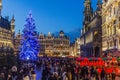 BRUSSELS, BELGIUM - DECEMBER 17, 2018: Evening view of the Grand Place (Grote Markt) with a christmas tree and Royalty Free Stock Photo