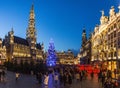 BRUSSELS, BELGIUM - DECEMBER 17, 2018: Evening view of the Grand Place (Grote Markt) with a christmas tree and Royalty Free Stock Photo