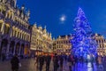 BRUSSELS, BELGIUM - DECEMBER 17, 2018: Evening view of the Grand Place (Grote Markt) with a christmas tree and Royalty Free Stock Photo