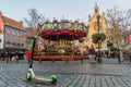 BRUSSELS, BELGIUM - DECEMBER 17, 2018: Old carousel and a Lime scooter at the St Catherine Christmas Market in Brussels Royalty Free Stock Photo