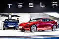 Tesla Model 3 and Tesla Model X at Brussels Motor Show, electric vehicle EV produced by Tesla, main shareholder Elon Musk