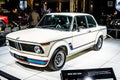 Vintage white iconic BMW 2002 Turbo 1973 Ginion Classics glossy and shiny old classic retro car at Brussels Motor Show Royalty Free Stock Photo