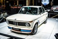 Vintage white iconic BMW 2002 Turbo 1973 Ginion Classics glossy and shiny old classic retro car at Brussels Motor Show Royalty Free Stock Photo