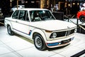 Vintage white iconic BMW 2002 Turbo 1973 Ginion Classics glossy and shiny old classic retro car at Brussels Motor Show Royalty Free Stock Photo