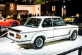 Vintage white iconic BMW 2002 Turbo 1973 Ginion Classics glossy and shiny old classic retro car at Brussels Motor Show Royalty Free Stock Photo