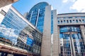 Brussels, Belgium - July 20, 2020: European Parliament offices and European flags Royalty Free Stock Photo