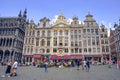 Brussels, Belgium - July 20, 2020: People walking through Brussels famous Grand Place where the City Hall and City Museum can be