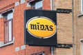 Logo and sign of Midas. Midas is provider automotive services primarily through franchised and company-operated garages Royalty Free Stock Photo