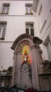 Brussels, Belgium - May 13, 2018: bronze fountain sculpture Manneken Pis in central Brussels