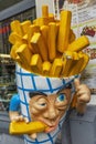 Brussels, Belgium, 10/13/2019: A model of traditional Belgian french fries on a street in the city center. Close-up.