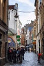 Brussels, Belgium, 10/14/2019: Narrow street with beautiful old houses in the European old town. Vertical Royalty Free Stock Photo