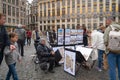 Brussels, Belgium - October 12 2019: A Local Painter showing his work on the Grand-Place in Central Brussels. The Grand Place is a