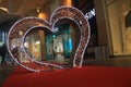 Brussels, Belgium, 16-12-2019: A red carpet decorated with a sculpture full of lights in the shape of a hearth Royalty Free Stock Photo