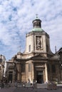 Main building of Church Of Notre Dame Du Finistere on the busy shopping street Rue Neuve. Vertical shot Royalty Free Stock Photo