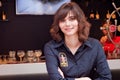 BRUSSELS, BELGIUM - SEPTEMBER 07, 2014: Unknown young woman in a branded shirt of the Bourgogne des Flandres brewery.