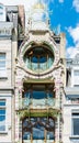 Brussels, Belgium - Typical art nouveau facade with shaped metal ornaments, round windows, arches