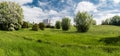 Brussels, Belgium: view over green meadows with the citybuildings in the background in the Zavelenberg meadows