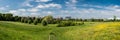 Brussels, Belgium view over green meadows with the citybuildings in the background in the Zavelenberg meadows