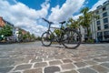 Brussels city center, Belgium - Low angle view over a trekking city bike at the Saint Catherine square