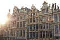 Brussels Grand Place. Sunset evening view of row of old beautiful stone buildings facades. Lots of artistic golden