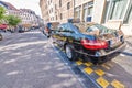 BRUSSELS - MAY 1, 2015: City taxi awaits customers along the street. Only taxis bearing the official Brussels taxi sign are